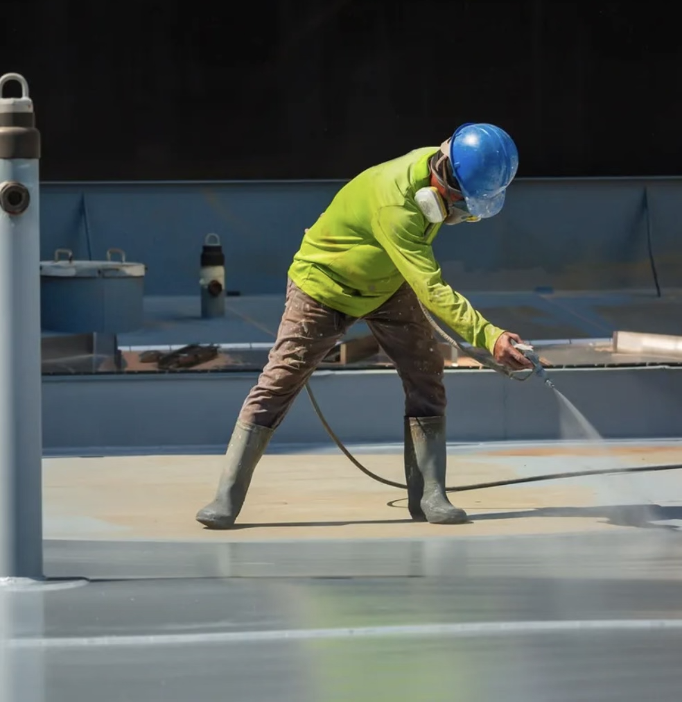 Surface preparation on commercial roof before coating to improve adhesion