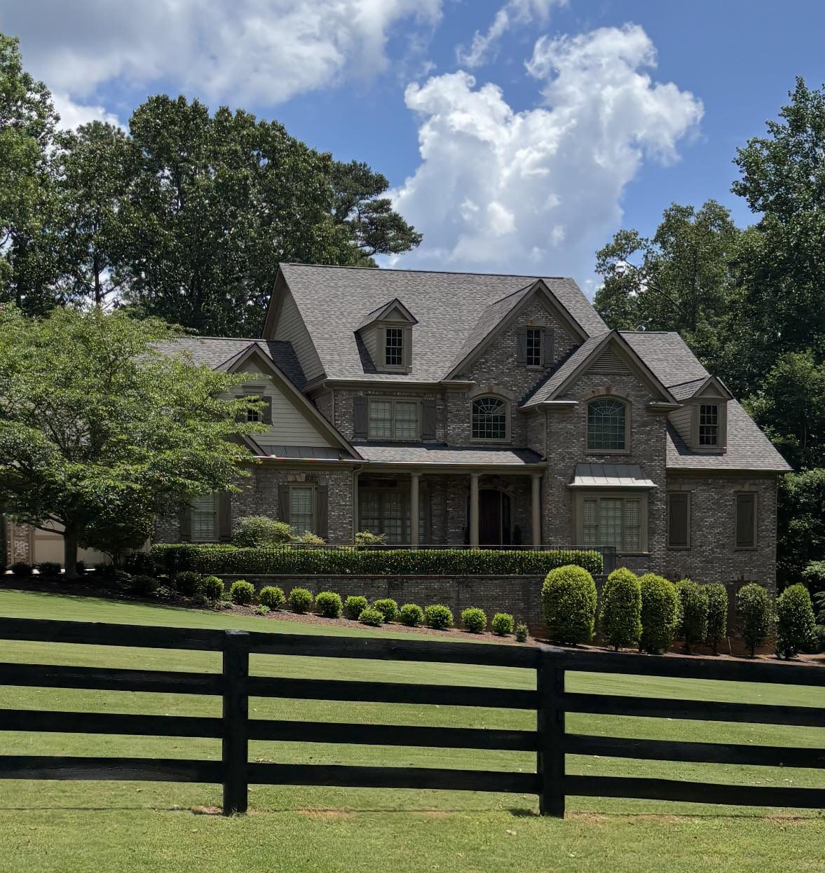 A closer look at the expertly installed architectural shingles on a beautiful Atlanta estate.