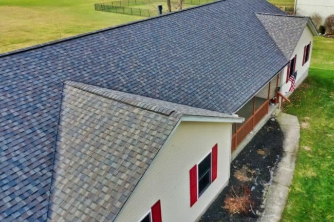 New multi-tonal architectural shingle roof on a classic American ranch-style house.